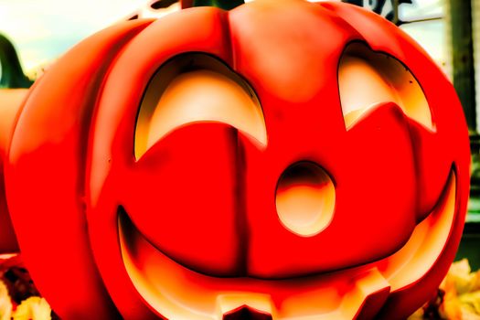 Halloween decorations concept.Close up of Jack O'lantern, vintage lanterns, pumpkins, skull, autumn leaves. Colorful Halloween. Happy Halloween scene background