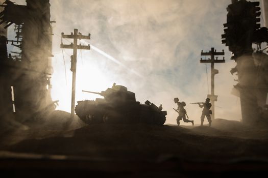 War Concept. Military silhouettes fighting scene on war fog sky background, World War Soldiers Silhouette Below Cloudy Skyline sunset. Selective focus