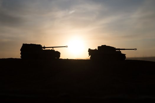 War Concept. Military silhouettes fighting scene on war fog sky background, World War Soldiers Silhouette Below Cloudy Skyline sunset. Selective focus