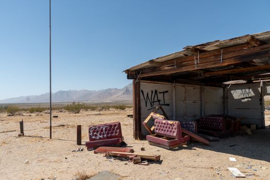 Abandoned house camper trailer in the middle of the desert in California's Mojave desert, near Ridgecrest. 