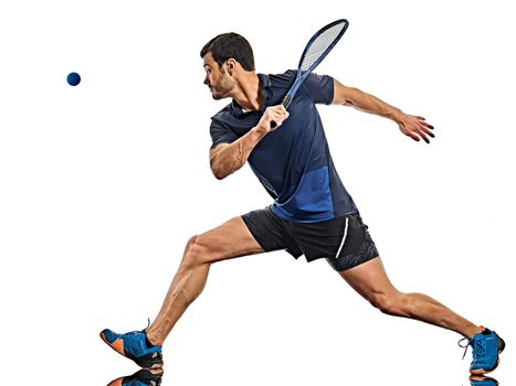 one caucasian mature man practicing squash player in studio isolated on white background