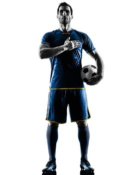 one caucasian soccer player man playing in silhouette isolated on white background