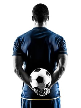 one caucasian soccer player man standing Rear View in silhouette isolated on white background