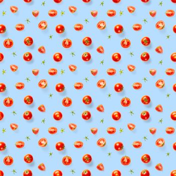 Seamless pattern with red ripe tomatoes. Tomato isolated on blue background. Vegetable abstract seamless pattern. Organic Tomatoes flat lay.