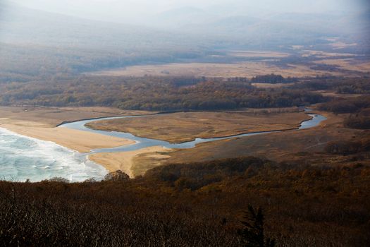 Sikhote-Alin Biosphere Reserve in the Primorsky Territory. Panoramic view of the sandy beach of the Goluchnaya bay and the lake