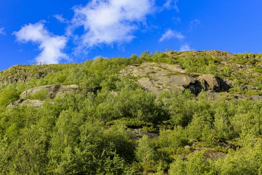 Clouds are flying above mountains in beautiful Hemsedal, Viken, Buskerud, Norway.