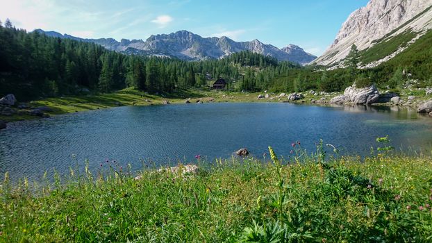 One of the lakes at Dolina Sedmerih jezer or seven lakes valley at Triglav National Park in Slovenia. Travel and tourism