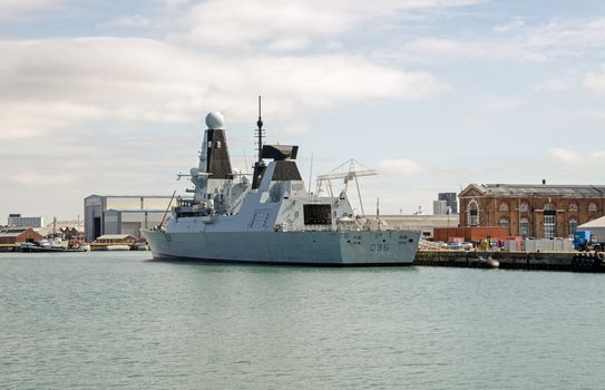 Portsmouth, UK - September 8, 2020: the Royal Navy destroyer HMS Defender, D36, moored at Portsmouth Harbour, Hampshire on a sunny summer day.