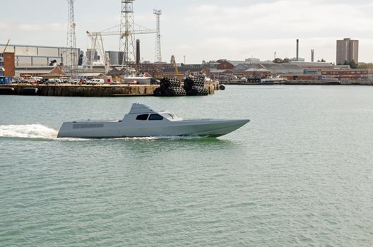 Portsmouth, UK - September 8, 2020: The prototype stealth boat being developed for the Special Boat Squadron as a fast interceptor craft by BAE Systems in Portsmouth Harbour, Hampshire.