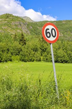 60s zone 60 road sign around red in Norway.