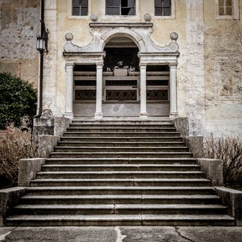 A long stair create the perspective to this 15th century Italian chapel.