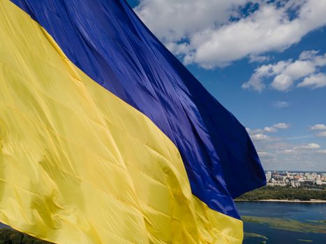 Kyiv - National flag of Ukraine by day. Aerial. Kiev