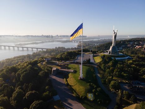 Kyiv - National flag of Ukraine by day. Aerial. Kiev