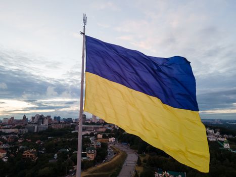 Kyiv - National flag of Ukraine by day. Aerial. Kiev