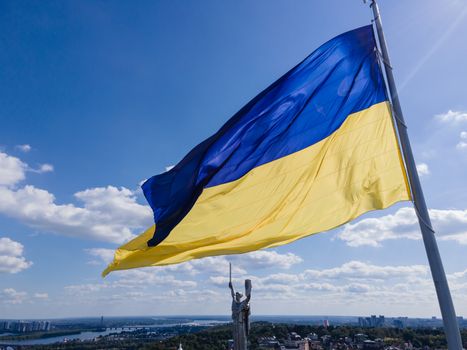 Kyiv - National flag of Ukraine by day. Aerial. Kiev