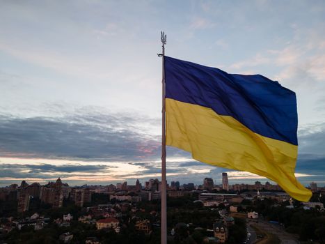 Kyiv - National flag of Ukraine by day. Aerial. Kiev