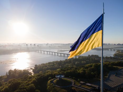 Kyiv - National flag of Ukraine by day. Aerial. Kiev