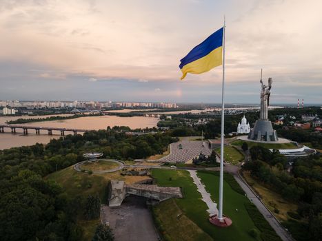 Kyiv - National flag of Ukraine by day. Aerial. Kiev