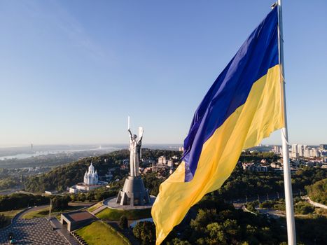 Kyiv - National flag of Ukraine by day. Aerial. Kiev