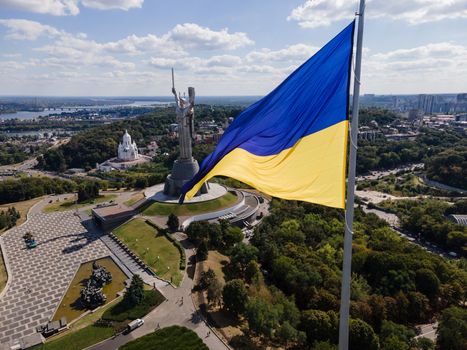 Kyiv - National flag of Ukraine by day. Aerial. Kiev