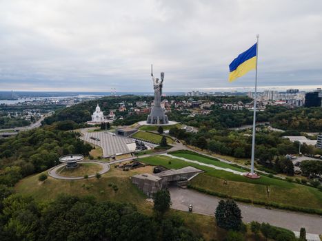 Kyiv - National flag of Ukraine by day. Aerial. Kiev