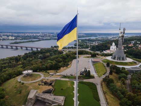 Kyiv - National flag of Ukraine by day. Aerial. Kiev