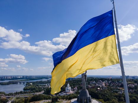 Kyiv - National flag of Ukraine by day. Aerial. Kiev