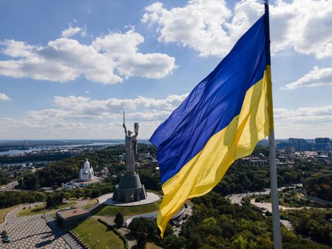 Kyiv - National flag of Ukraine by day. Aerial. Kiev