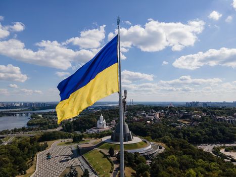 Kyiv - National flag of Ukraine by day. Aerial. Kiev