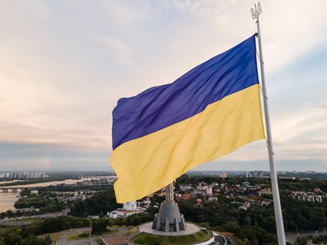 Kyiv - National flag of Ukraine by day. Aerial. Kiev