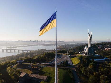 Kyiv - National flag of Ukraine by day. Aerial. Kiev