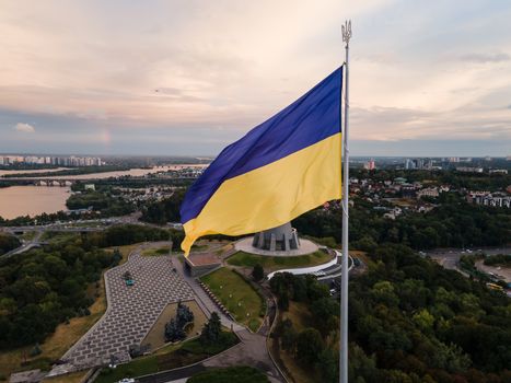 Kyiv - National flag of Ukraine by day. Aerial. Kiev