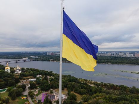 Kyiv - National flag of Ukraine by day. Aerial. Kiev