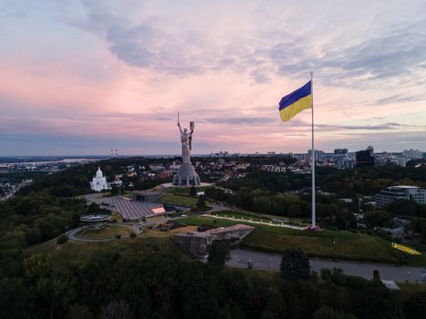 Kyiv - National flag of Ukraine by day. Aerial. Kiev