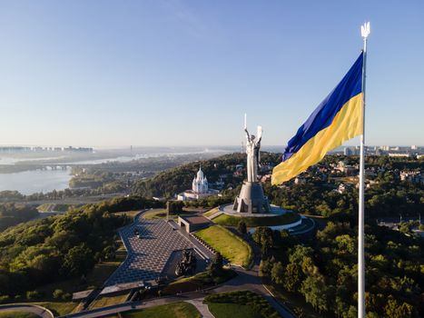 Kyiv - National flag of Ukraine by day. Aerial. Kiev