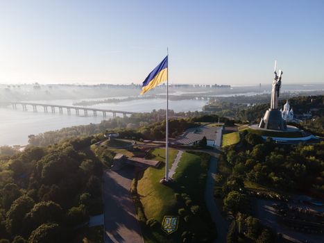 Kyiv - National flag of Ukraine by day. Aerial. Kiev