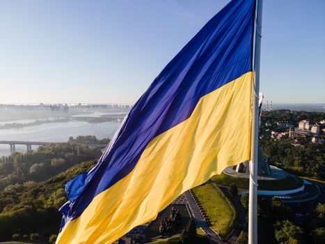 Kyiv - National flag of Ukraine by day. Aerial. Kiev