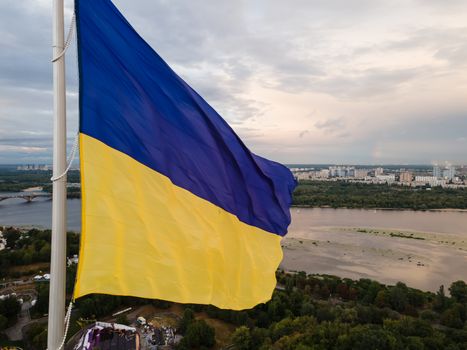 Kyiv - National flag of Ukraine by day. Aerial. Kiev