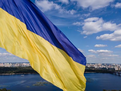 Kyiv - National flag of Ukraine by day. Aerial. Kiev