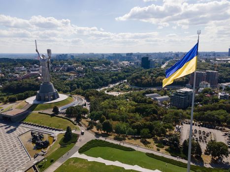 Kyiv - National flag of Ukraine by day. Aerial. Kiev