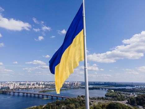 Kyiv - National flag of Ukraine by day. Aerial. Kiev