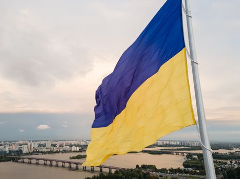 Kyiv - National flag of Ukraine by day. Aerial. Kiev