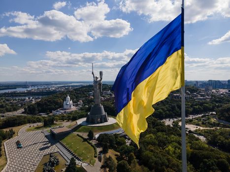 Kyiv - National flag of Ukraine by day. Aerial. Kiev