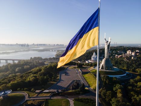 Kyiv - National flag of Ukraine by day. Aerial. Kiev