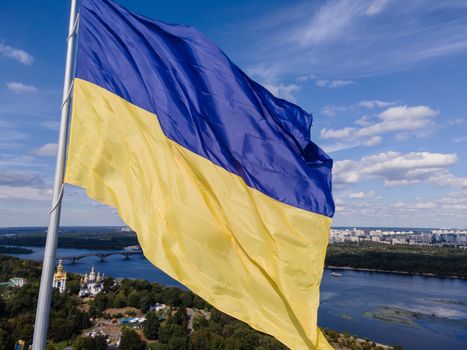 Kyiv - National flag of Ukraine by day. Aerial. Kiev