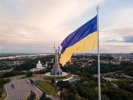 Kyiv - National flag of Ukraine by day. Aerial. Kiev