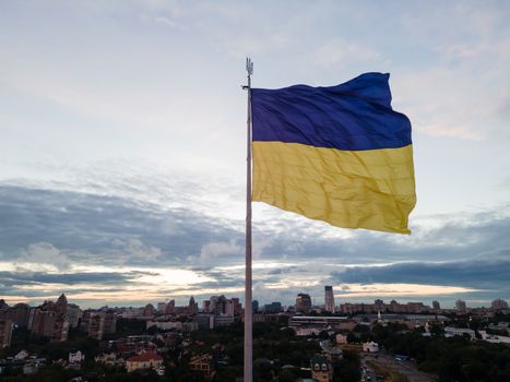 Kyiv - National flag of Ukraine by day. Aerial. Kiev