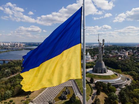 Kyiv - National flag of Ukraine by day. Aerial. Kiev