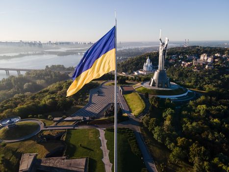 Kyiv - National flag of Ukraine by day. Aerial. Kiev