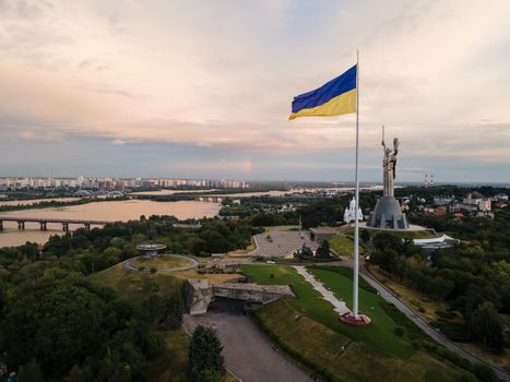 Kyiv - National flag of Ukraine by day. Aerial. Kiev